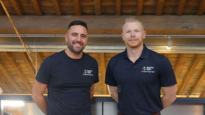 Two members of Aspire 2Be staff
