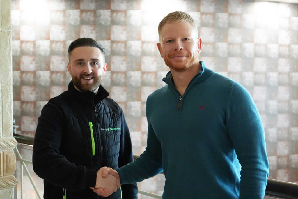 Matt Smith of Aspire 2Be and Green Light Solutions shaking hands